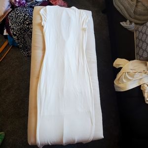 41. White bodycon midi dress with cutout